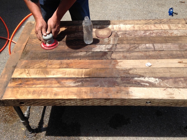 To finish off our table it received a really vigorous sanding job 